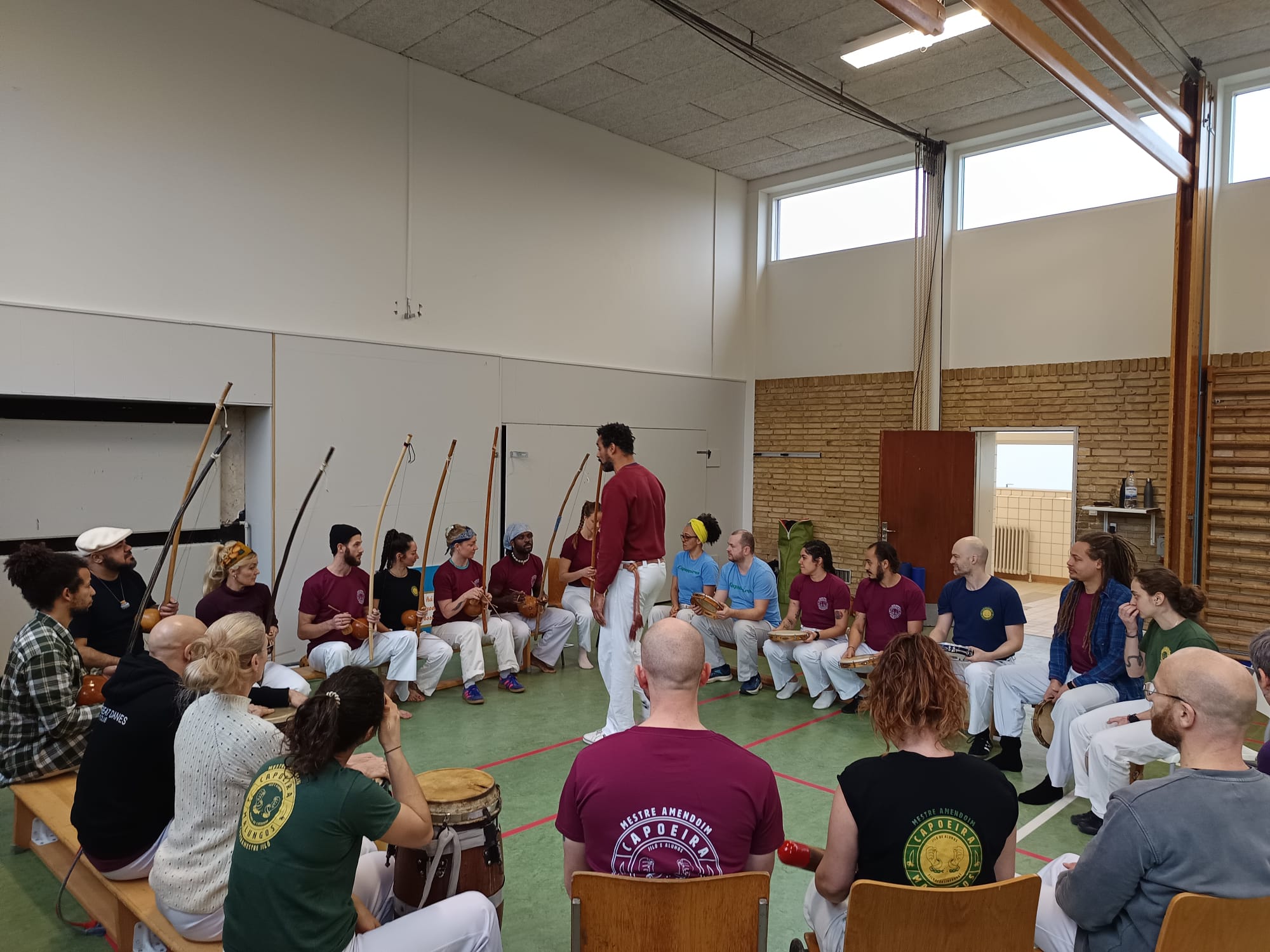 Capoeirista playing the Berimbau instrument